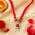 Rudraksh Drop Charm Bhabhi Rakhi - House of RangReethi