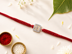 Stone-Studded Ganesha Silver Rakhi